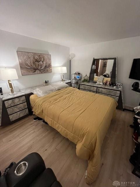 bedroom featuring hardwood / wood-style floors