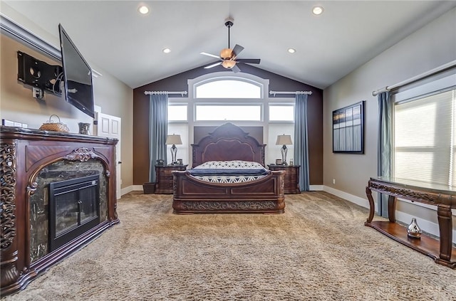 carpeted bedroom featuring ceiling fan and lofted ceiling