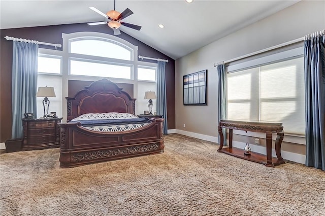 carpeted bedroom with ceiling fan and lofted ceiling