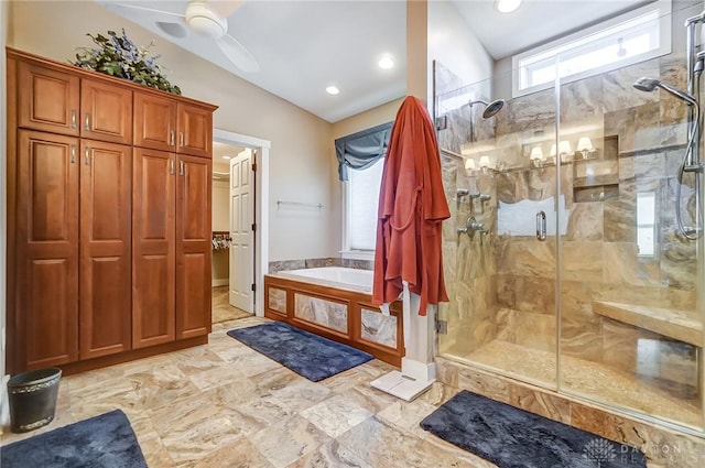 bathroom with ceiling fan, lofted ceiling, and shower with separate bathtub