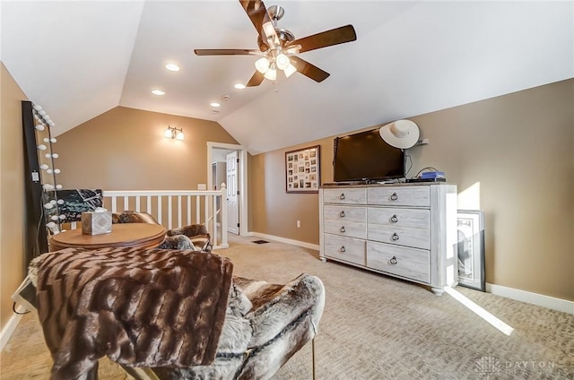 carpeted living room featuring ceiling fan and vaulted ceiling