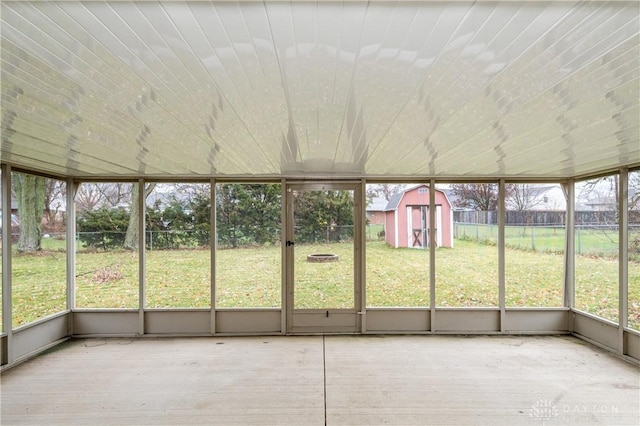 unfurnished sunroom with plenty of natural light