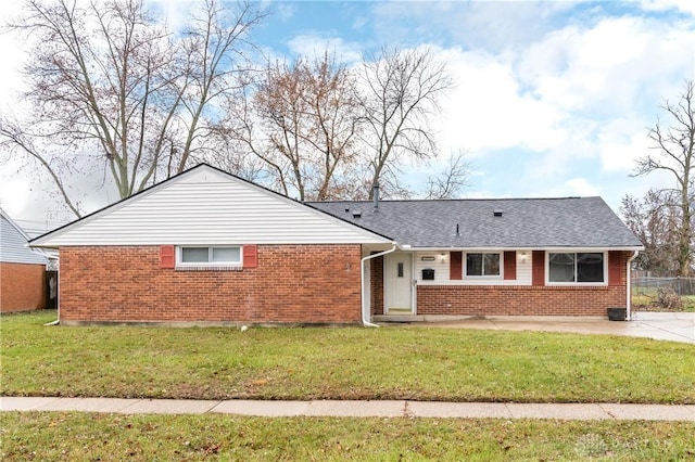 ranch-style house with a front yard