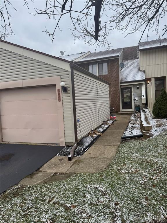 exterior space with a garage