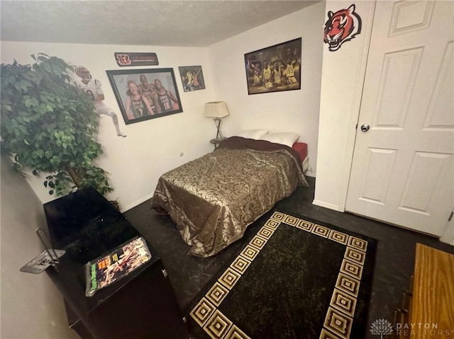 bedroom with lofted ceiling