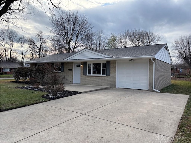 single story home with a front lawn and a garage