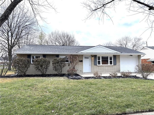 single story home with a garage and a front yard