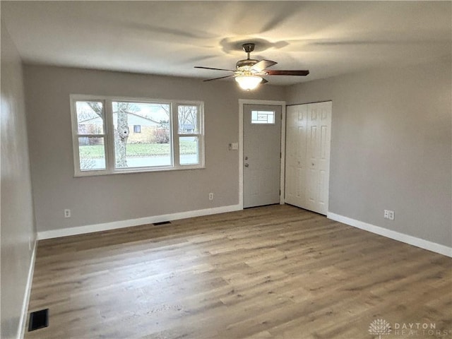 foyer featuring hardwood / wood-style floors and ceiling fan