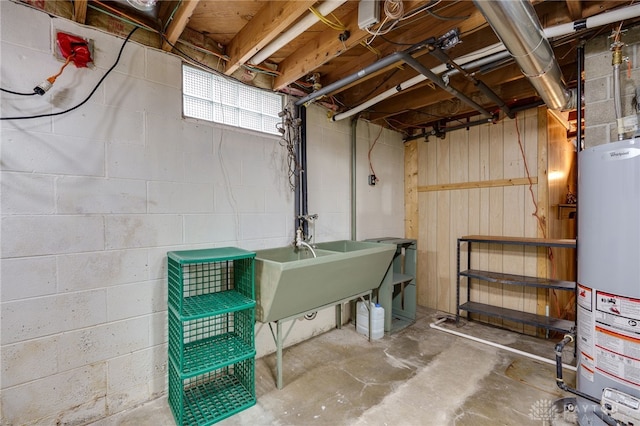 basement featuring sink and gas water heater