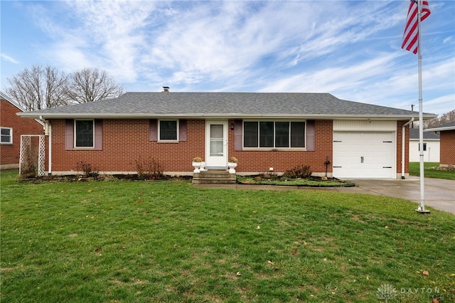 ranch-style home featuring a garage and a front lawn