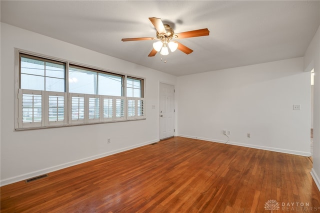 unfurnished room featuring hardwood / wood-style flooring and ceiling fan