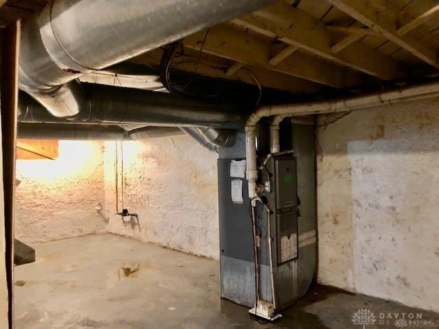 basement featuring heating unit