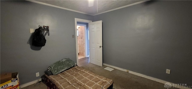 bedroom with carpet, ceiling fan, crown molding, and a textured ceiling