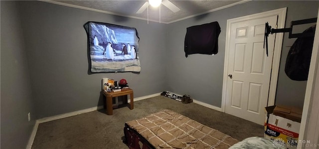 bedroom featuring ceiling fan, crown molding, carpet floors, and a textured ceiling