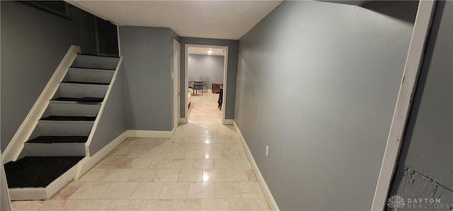 hallway with light tile patterned flooring