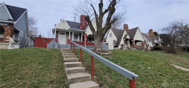 view of front of house with a front lawn