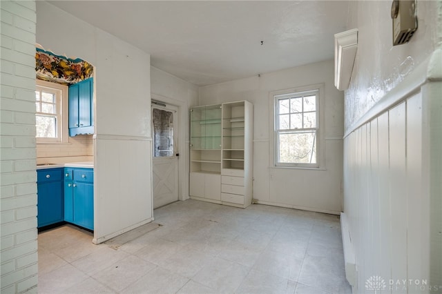 unfurnished room featuring a healthy amount of sunlight