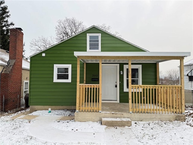 bungalow-style home featuring a porch