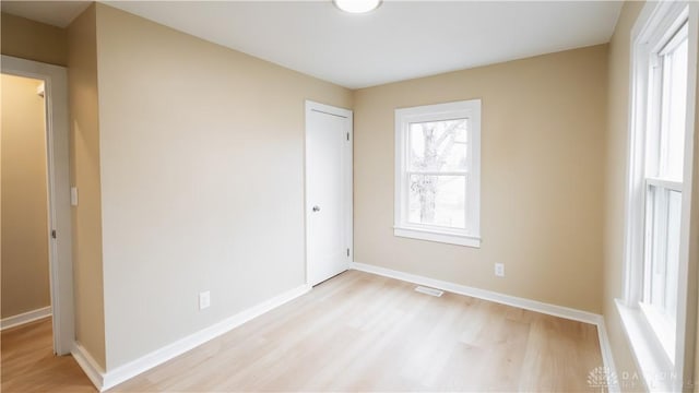 unfurnished bedroom with light hardwood / wood-style flooring