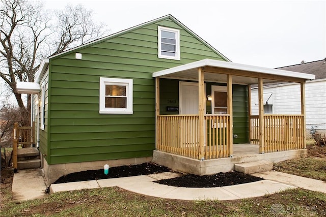 bungalow-style home with a porch