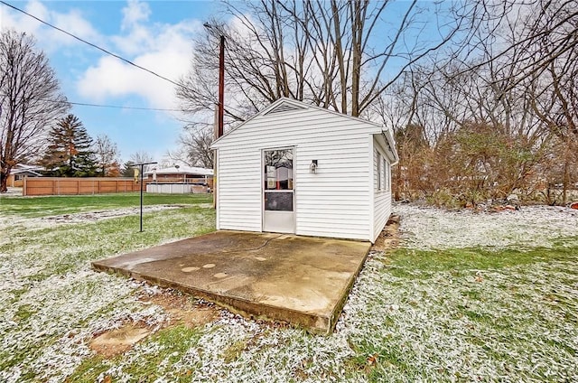 view of outbuilding featuring a yard