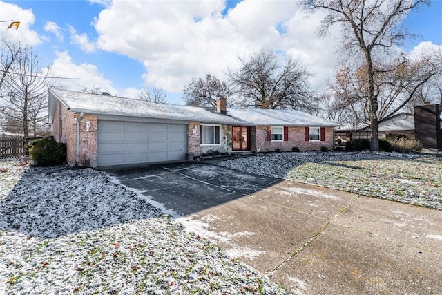 single story home featuring a garage