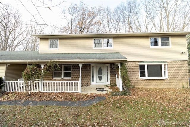 view of property featuring a porch