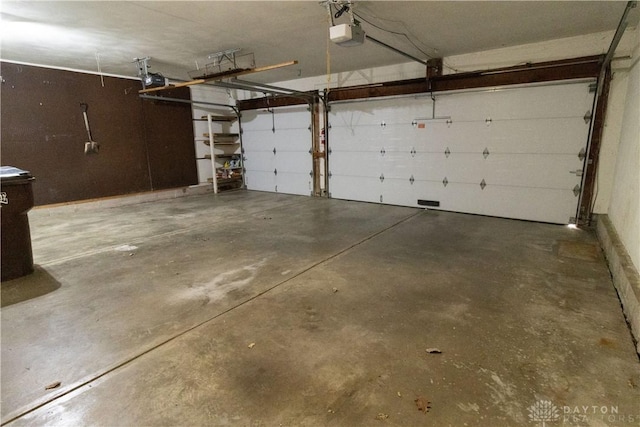 garage featuring a garage door opener