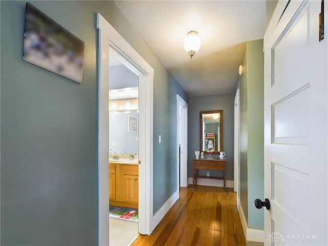 hallway with wood-type flooring