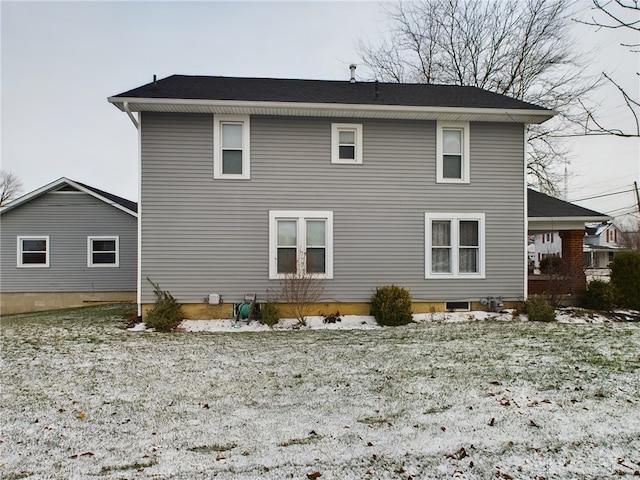 view of snow covered property