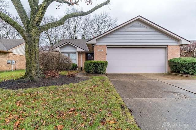 single story home featuring a garage