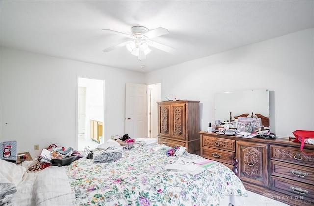 bedroom featuring ensuite bathroom and ceiling fan