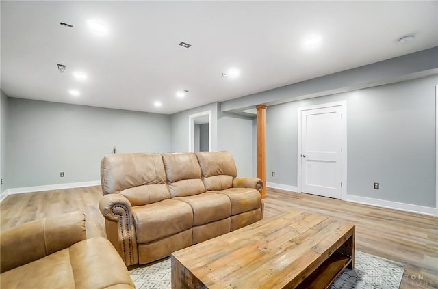 living room with light hardwood / wood-style floors