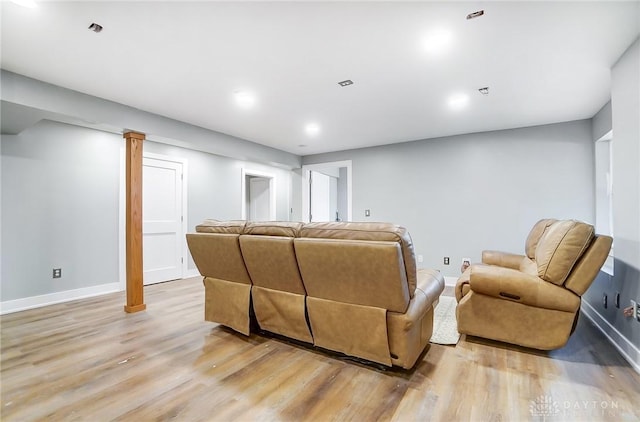 living room with light hardwood / wood-style floors