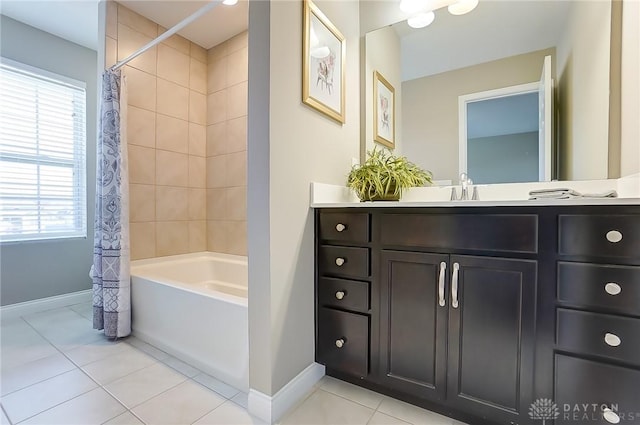 bathroom with tile patterned floors, vanity, a healthy amount of sunlight, and shower / tub combo with curtain