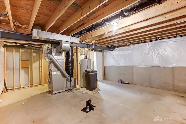 basement with heating unit and water heater