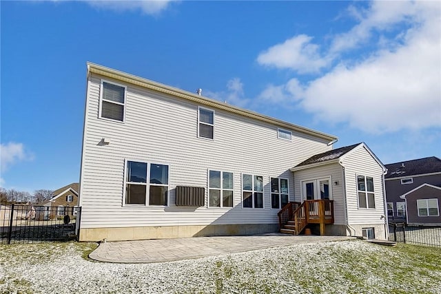 rear view of house featuring a patio