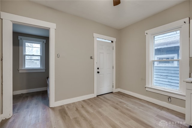 foyer with light hardwood / wood-style floors