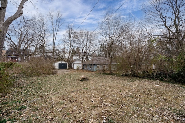 view of yard featuring a garage