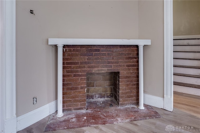 details featuring wood-type flooring and a fireplace