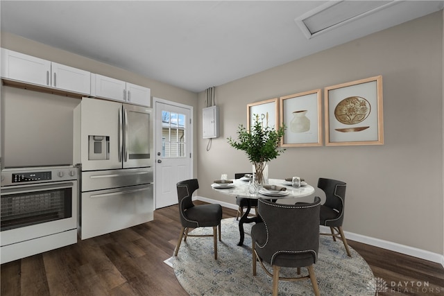 343 Sheelin Rd, Xenia, OH 45385 - dining area featuring dark wood-style flooring and baseboards