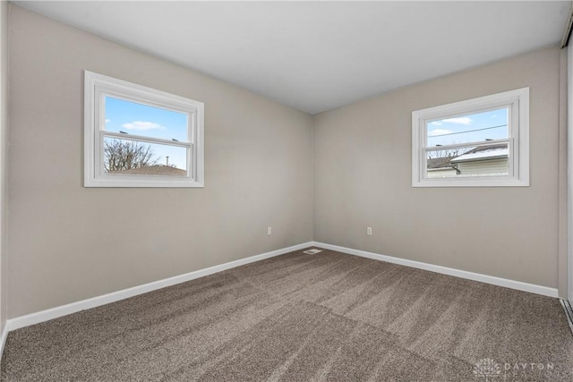 343 Sheelin Rd, Xenia, OH 45385 - unfurnished room with baseboards and carpet floors