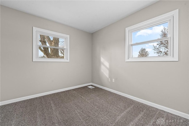 view of carpeted spare room