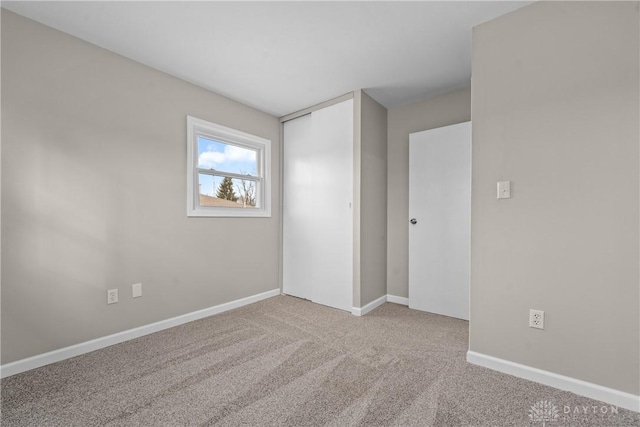 343 Sheelin Rd, Xenia, OH 45385 - unfurnished bedroom featuring carpet and a closet