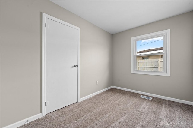 343 Sheelin Rd, Xenia, OH 45385 - unfurnished bedroom with carpet flooring and baseboards