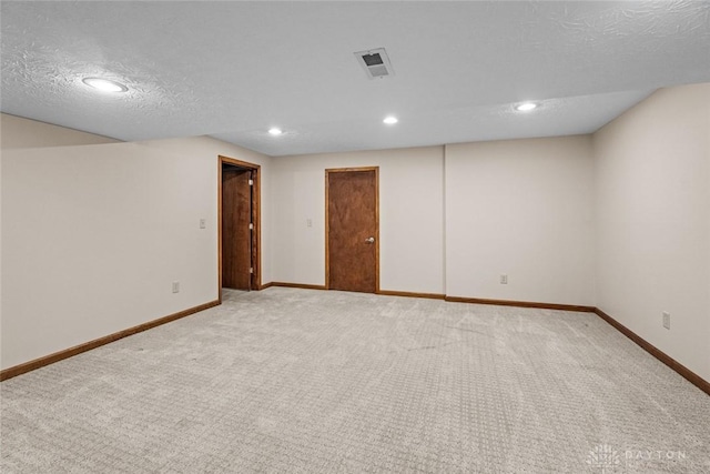 interior space featuring a textured ceiling