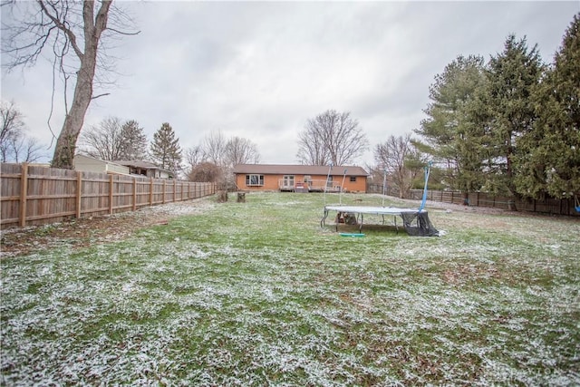 view of yard featuring a trampoline