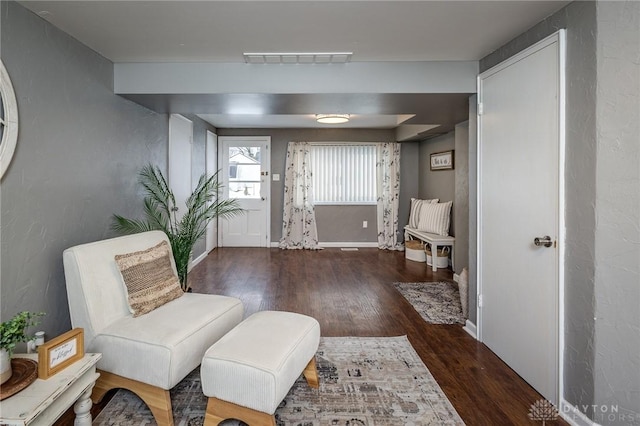 living area with dark wood-type flooring