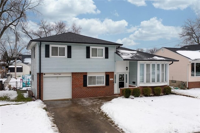 split level home with a garage