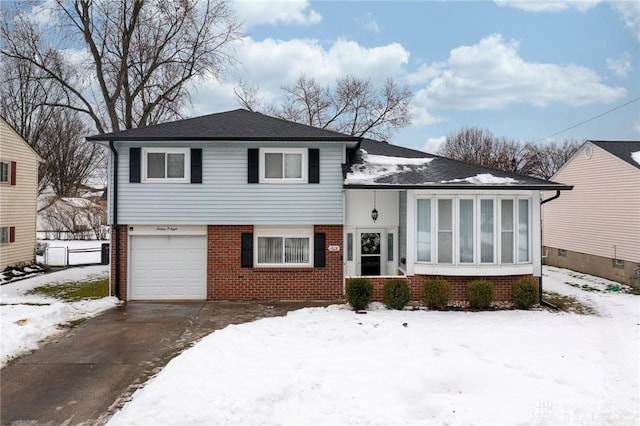 tri-level home featuring a garage